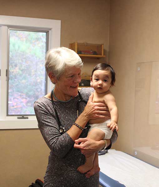 doctor holding baby